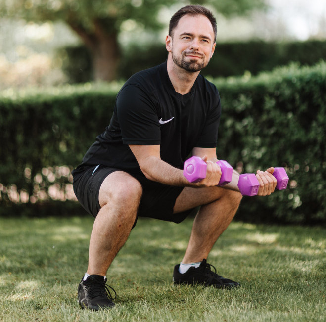 Man exercising with dumbbells